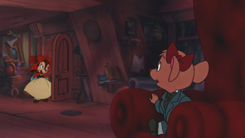 A digitally composited image of Olivia Flaversham and Tanya Mousekewitz, created using Disney and other screencaps. Olivia is sitting in an armchair, looking towards the door of the room she is sitting in, smiling. Tanya is standing, just inside the open door.