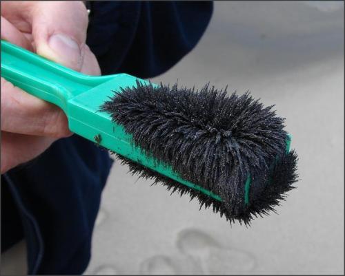 So much beauty in dirtThis hand is holding a magnet that was dipped into the sand at Piha black sand