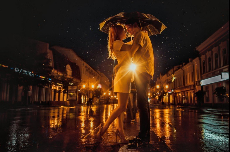 Black and white couple in rain