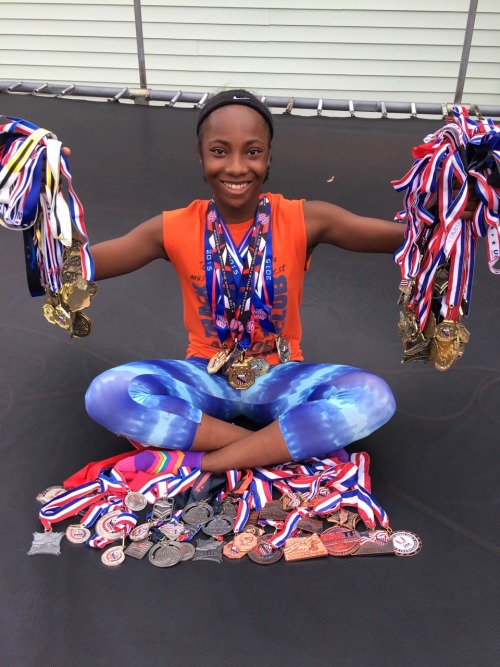 llamadelraisin:  fanniesandpanties:  my little sister is 13 years old and has been running track for 4 years. all the medals in both hands are GOLD. the ones in front are bronze and silver. around her neck are national medals. she’s broken 2 AAU records