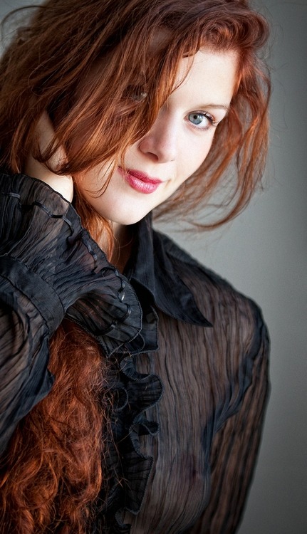 Stunning redhead with amazing eyes. adult photos