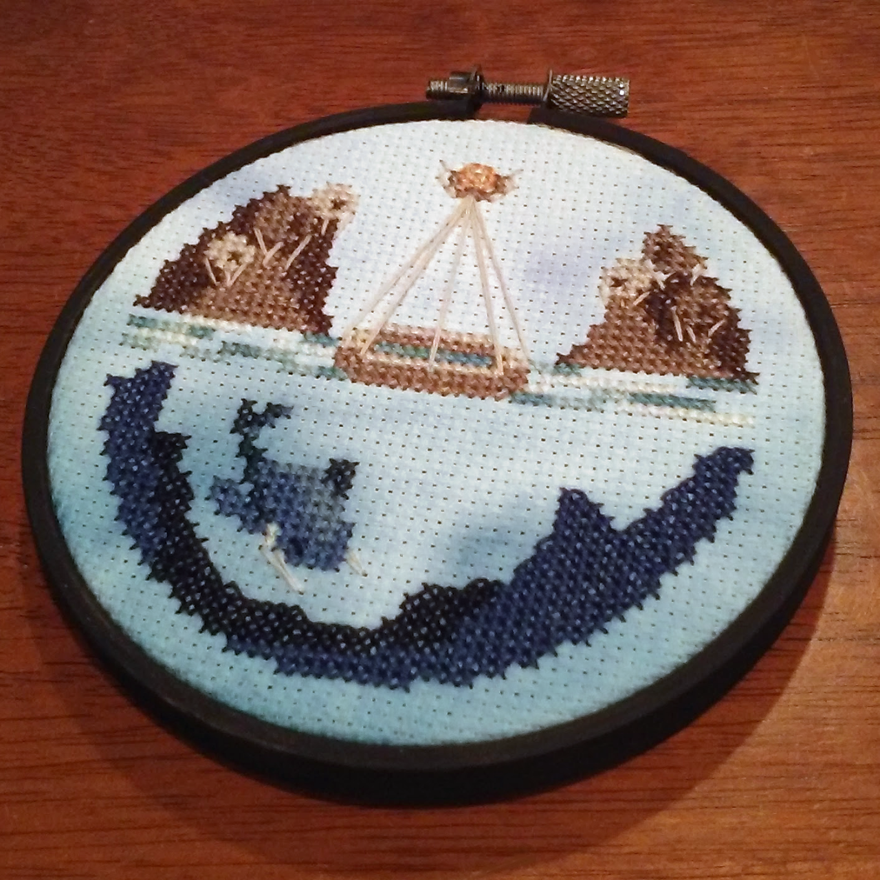 cloudmarsh:  BAM! It’s some more Myst cross-stitch! Trying out some backstitching,
