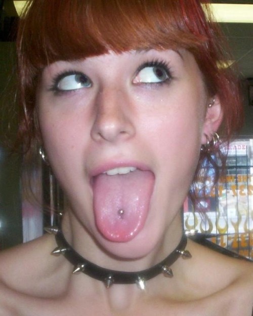 I bet this submissive collared slut is very good at sucking cock with that pierced tongue