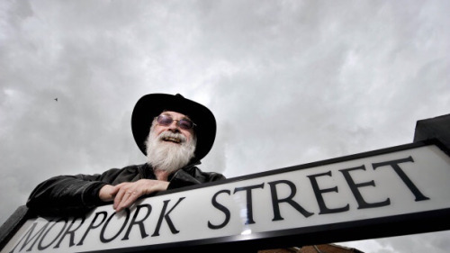 lost-carcosa:Sir Terry Pratchett, 28 April 1948 – 12 March 2015(Morpork Street is in the town of Win