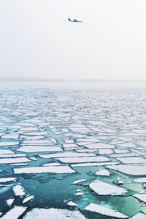 vurtual:  Frozen Lake and airplane - Toronto, Canada (by Vincent Demers)