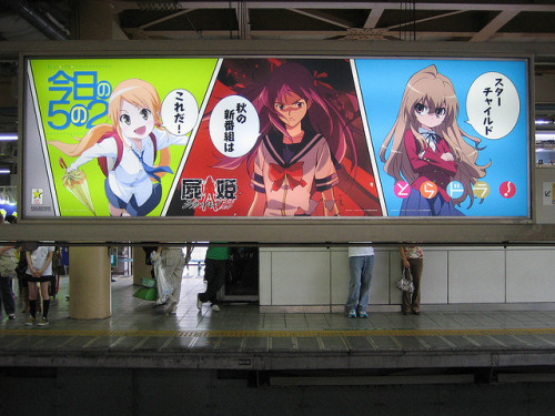 Manga in metro by Miepcita on Flickr.