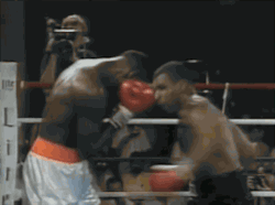miketysonknockouts:  Classic Mike Tyson working a 4-6 combination out of the clinch. Notice how he pauses to position his opponents head before delivering the kill shot. Greatness only comes through obsession: click here to read about Mike Tyson and Cus