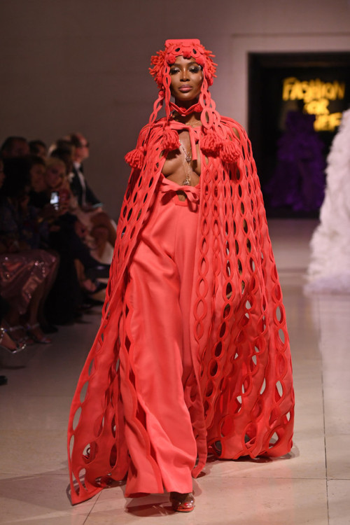 Naomi Campbell wearing Jean-Paul Gaultier Fall/Winter 2019 Haute Couture and Valentino Fall/Winter 2