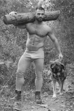 onlookerokc:menintojeans: Boots, calves, jeans off and feeling free.A boy, his dog and his log 