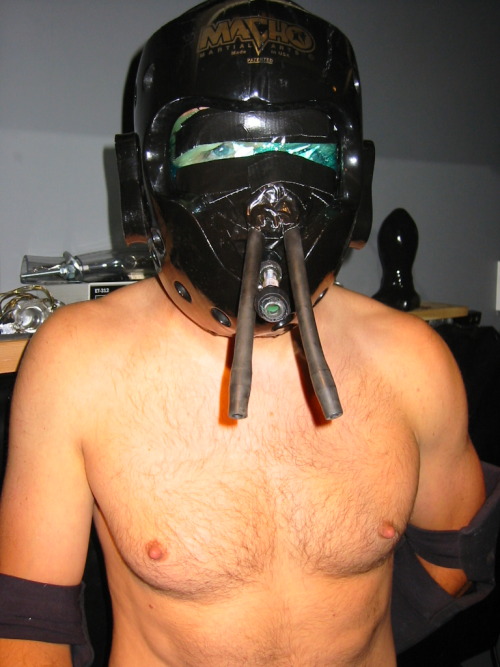 ropenbag:  Transformation Through Mummification: Start with a willing or semi willing victim. Add a gag, then head gear, pads as needed and just keep going.  He can no longer complain or resist.  once semi secured, add milker, electric plug, then excess