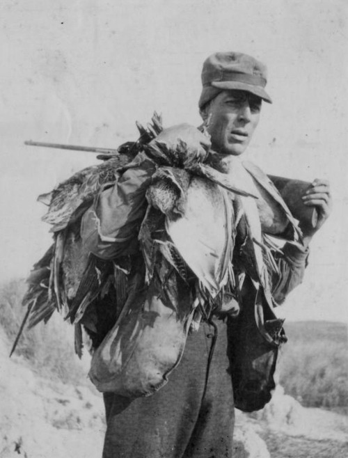 gunsandposes:Hunter with rifle and ducks in Louisiana, 1930s. La. Dept. of Conservation via the Stat