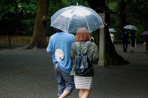 Couple leaving Meiji shrine, Tokyo, Japan