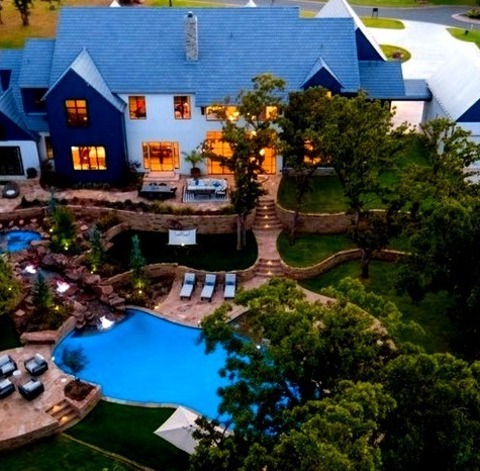Oklahoma City Natural PoolPool - Large Transitional Backyard Stone And Custom-shaped Natural Pool Idea