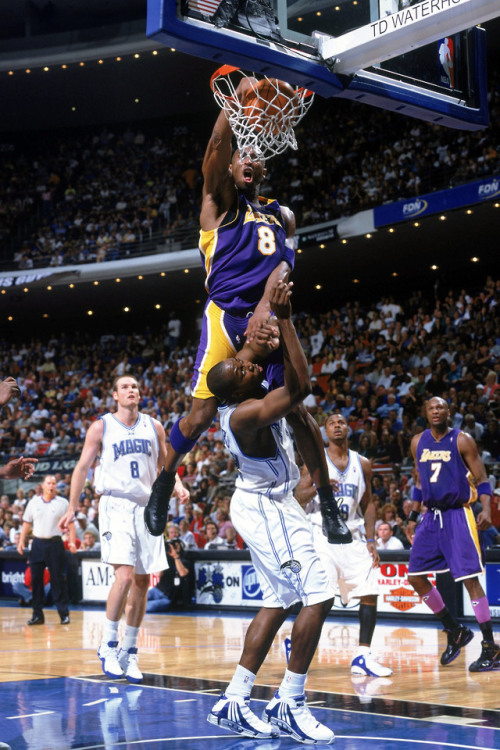 seddikstah:Kobe Bryant #8 of the Los Angeles Lakers makes a dunk against Dwight Howard #12 of the Or
