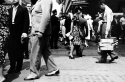 onlyoldphotography:  Rudy Burckhardt: Pedestrians, New York City: Young Man Carrying Shoe Boxes, ca.1939 