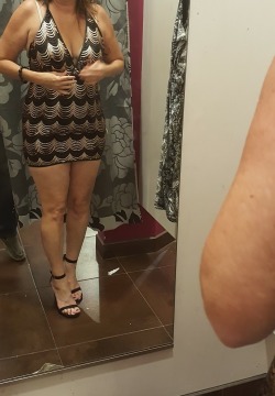 txryan77:  Wife trying on dresses. This one is tight and short.