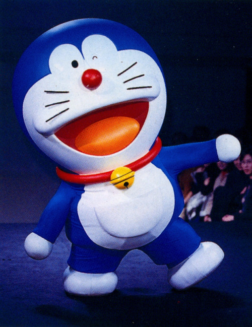 docpile:  doraemon walking lad musician’s