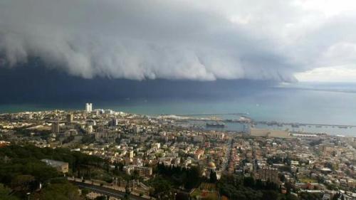 girlactionfigure: Dramatic storm front plows into #Haifa, #Israel, as rain, hail and even snow spatt