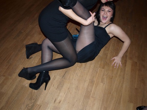 Playing girls in black pantyhose and tight dress. Girls in pantyhose