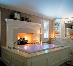 sweetestesthome:  Infinity bath tub with fireplace 