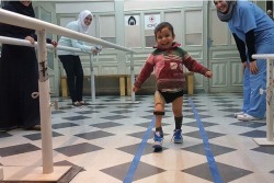 yourakh:Haitham’s first steps at a rehabilitation center in Aleppo after his legs were blown off.