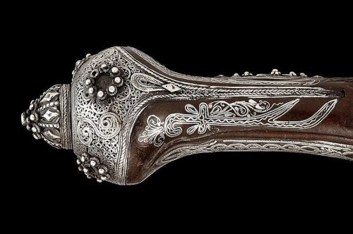 A pair of engraved, silver stocked flintlock pistols originating from Turkey, circa 1800.