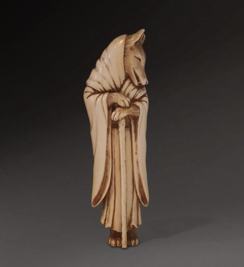 centuriespast:A netsuke representing a kitsune (a magical fox) disguised as a priest.Signed Wakyosai. Early 19th century.Collection of Kitsune Japanese Art.