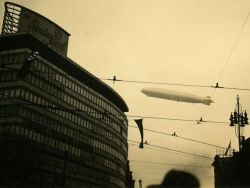 danismm:  Graf Zeppelin over the Columbushaus at Potsdamerplatz.  Berlin, 1933  