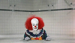 classichorrorblog:Tim Curry as Pennywise The Clown in Stephen King’s IT (1990)Directed by Tommy Lee 