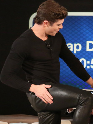 Zac Efron wearing black leather tight skinny jeans on Ellen