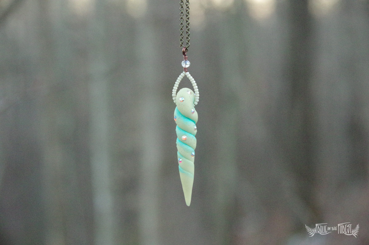 frolicingintheforest:  Glow-in-the-Dark Unicorn Horn Necklaces!  Hand sculpted from