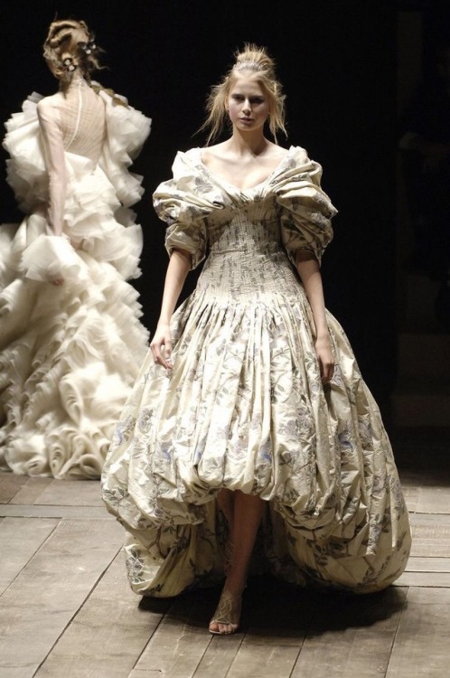 Left: 1830s Regency Era gown with detachable sleeves. Right: Fall 2006 Alexander McQueen gown.