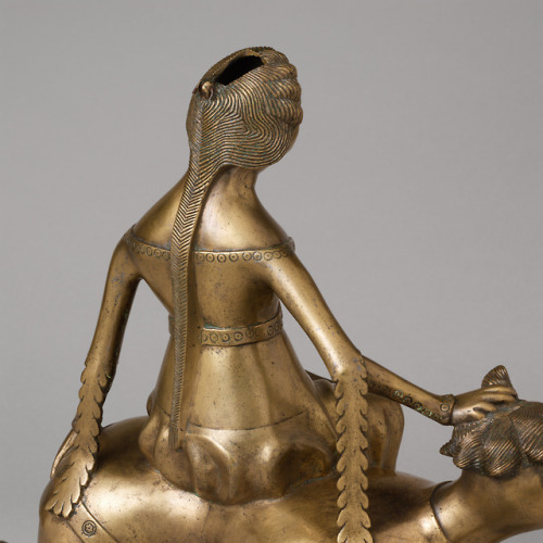 Aquamanile in the Form of Aristotle and Phyllis (c. 14th c.). Detail.An aquamanile is a vessel for p