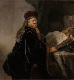 A Scholar Seated at His Desk, Rembrandt,