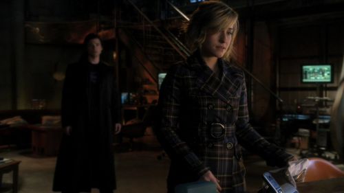 graybandanna:  Allison Mack hooded, cuffed and gagged on Smallville.  Interesting that after she is free, she keeps the handcuffs and handkerchief and walks them over to her desk