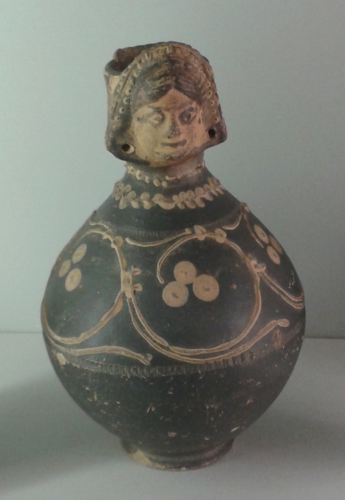 gunhilde:Roman face jar, made in the Nene Valley, Cambridgeshire, on display at Norwich Castle Museu