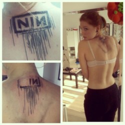 kairaanix:  Got my #nin tattoo. It was painful as hell in some spine parts. But I’m glad I have it! 