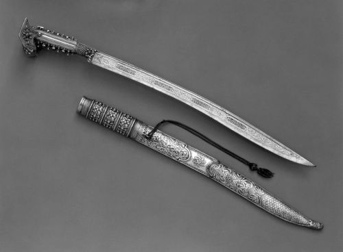 art-of-swords:  Yatagan Sword Dated: A.H. 1238/A.D. 1822 Culture: Anatolian or Balkan Medium: steel, silver, gold, coral Measurements: overall lenght 29 ¼ inches (74.3 cm); blae lenght 22 1/8 inches (56.2 cm) Inscription: inscribed with the date 1238