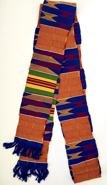 The colors in this kente cloth from our collection represent peace and harmony, mother earth, harves
