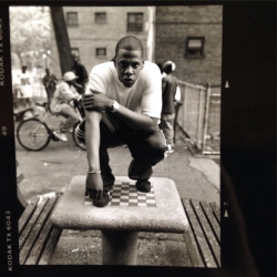 aintnojigga:Jay-Z, photographed outside his childhood home in the Marcy Projects for In My Lifetime, Vol. 1 by Jonathan Mannion in 1997.