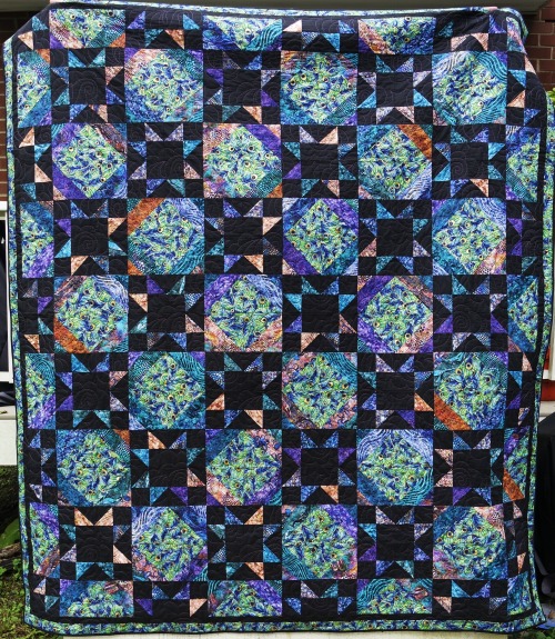 Just picked this one up from the quilters. She did a nice paisley pattern on it in a lavender thread
