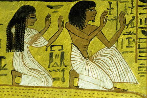 Sennedjem and his wife Iyneferti kneeling before the Gods,detail of a wall painting from the Tomb of