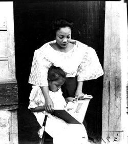 bookmania:  Filipina girl reading with her mother, 1800s (via womenreading) 