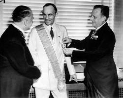 Henry Ford receiving the Grand Cross of the