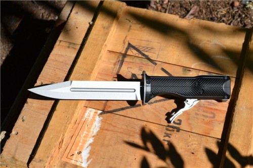 gunrunnerhell:G.R.A.D Knife GunA hybrid weapon that combines a knife with a revolver. You can see th