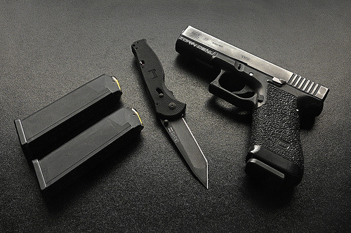 gunsknivesgear:  SOG Flash and Glock by Zorin Denu. The knife always goes with the