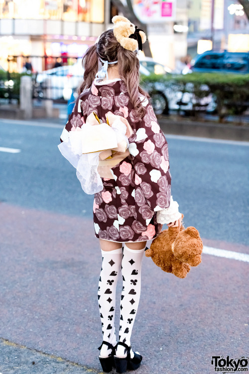 tokyo-fashion:  Sakibon and Ayane on the street in Harajuku. Sakibon is wearing a floral kimono dress, over-the-knee socks, platform heels, and a cute teddy bear. Ayane is wearing an amazing handmade Japanese kimono made out of Levi’s jeans with Fenty