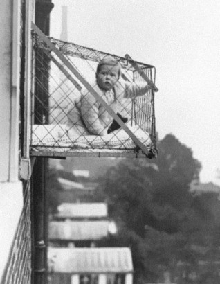 ahkep:  actionables:  the past is a strange place cops on bikes used to transport criminals like this  this guy worked as an alarm for waking people up  one wheel motorcycle  pin-boys who manually lined pins up  baby cage for families who wanted their