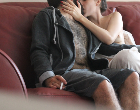 buttsandbeard:  Stealing a kiss between shoots.  