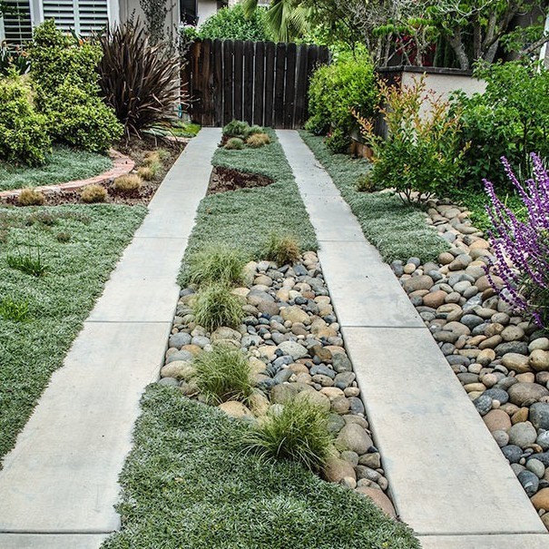 Viking Pavers — Simple, economical, and stylish ribbon driveways...